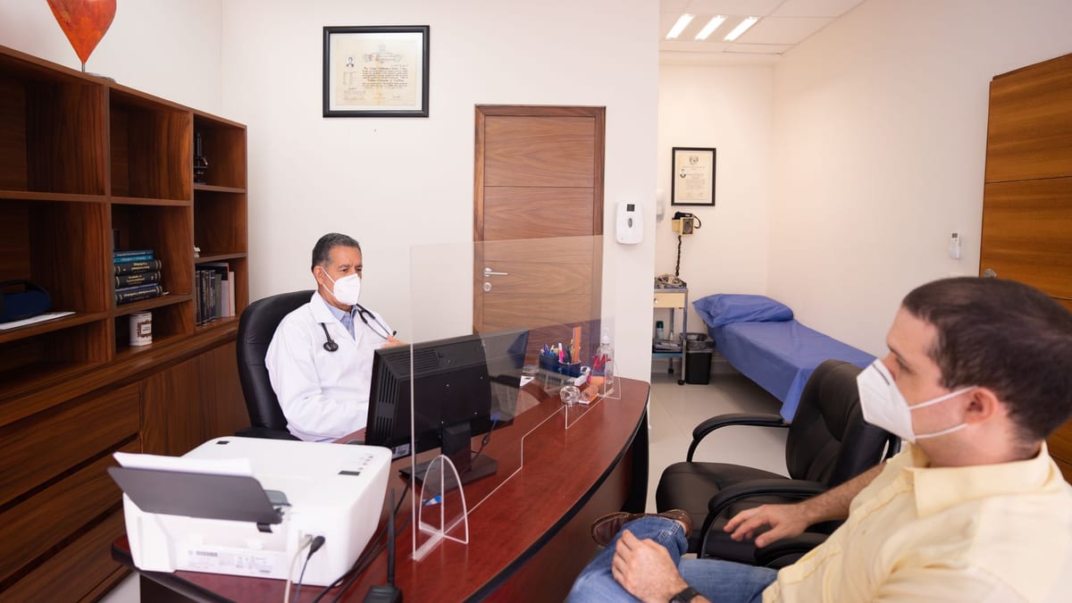A doctor's consultation office, where facelift recovery is explained step by step