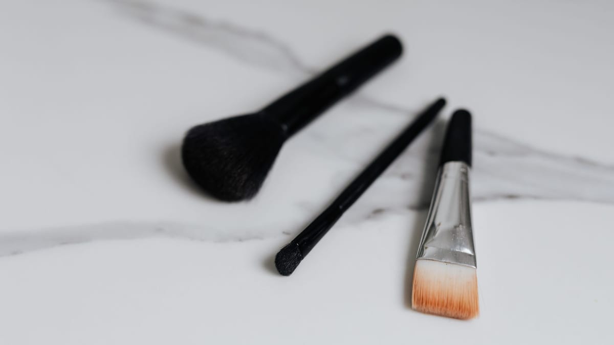 A chemical peel solution and applicator brush at a skin clinic