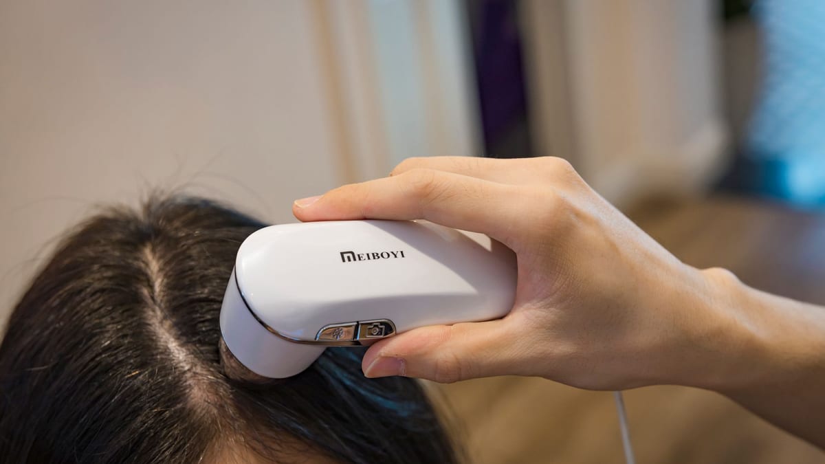 A scalp examination at a hair restoration clinic