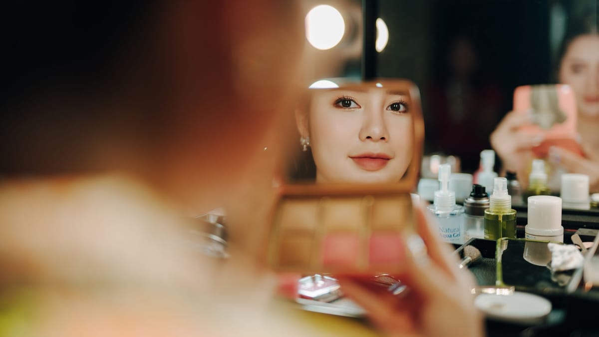 A clinic mirror under soft light, where results are checked