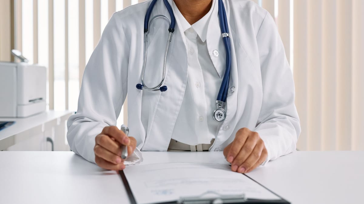A surgical consultation desk, where a tummy tuck is quoted